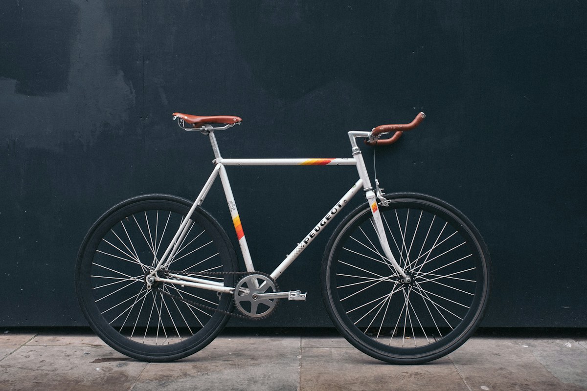 Bicycle beside a wall — illustrative stock photo