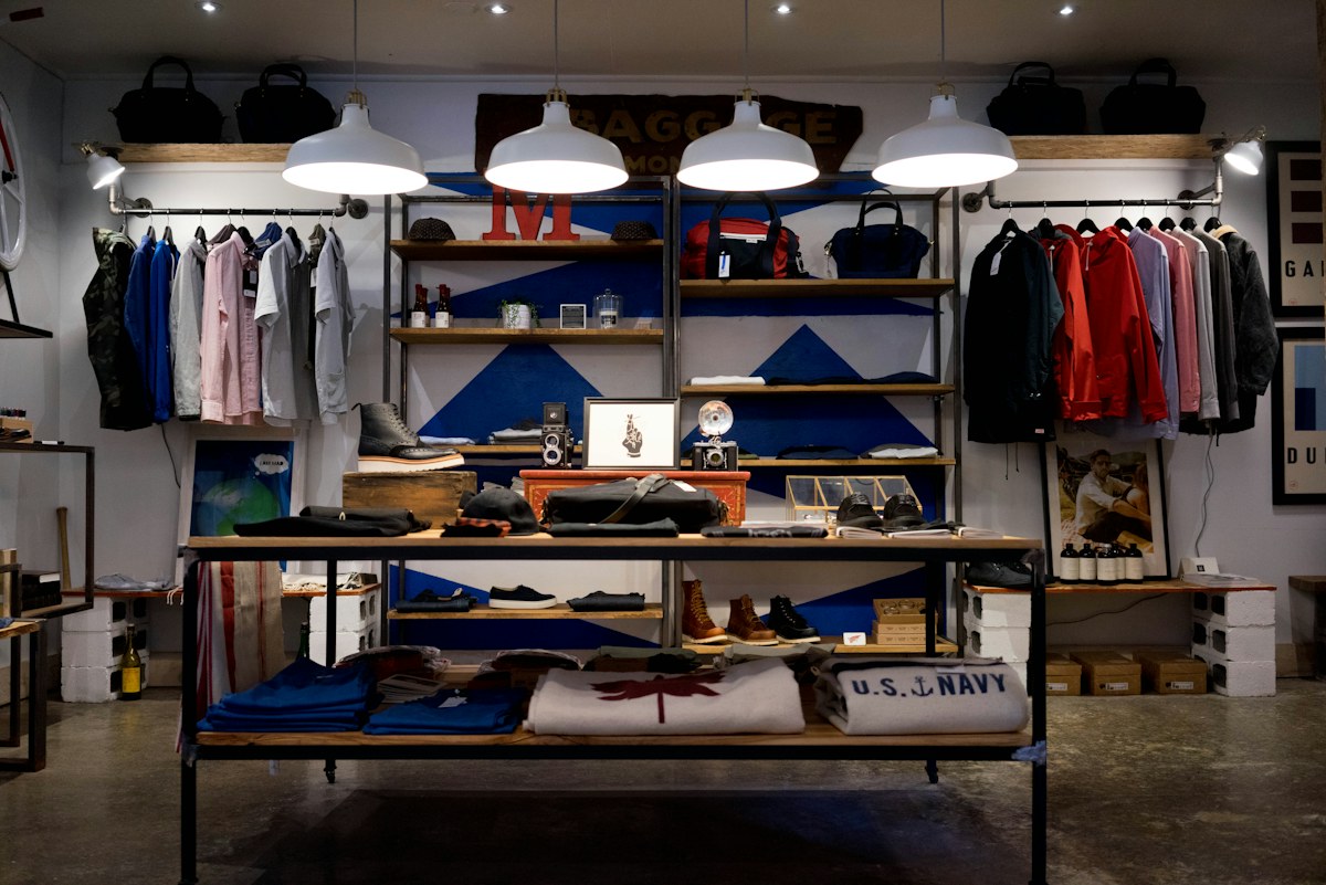 Bright clothing shop interior — illustrative stock photo
